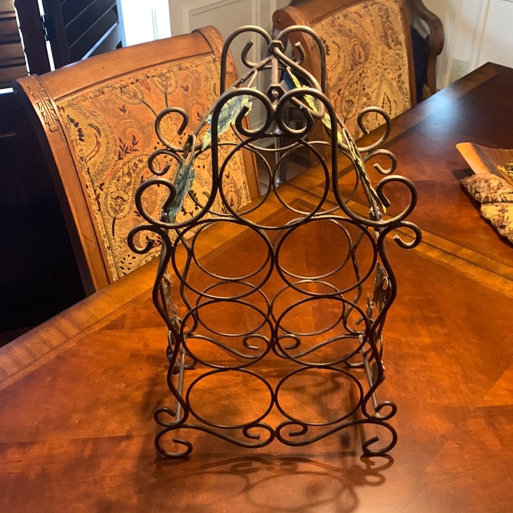 Wine rack with storage for seven bottles
